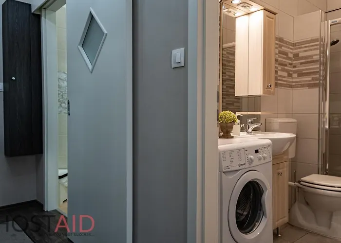 V68 Design - Hostaid Apartament