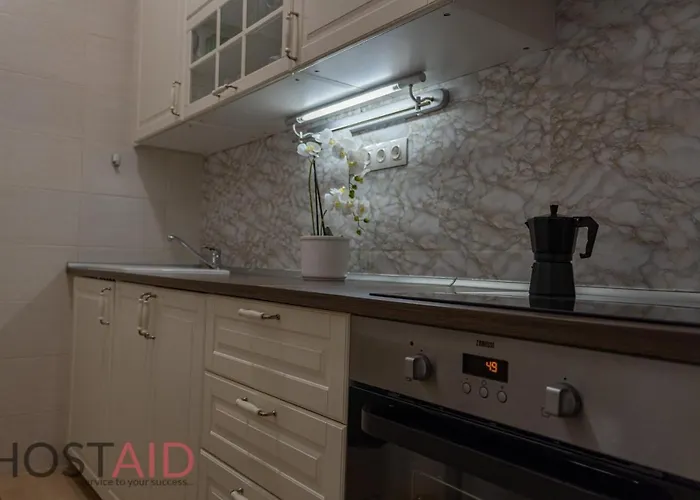 V68 Design - Hostaid Apartament